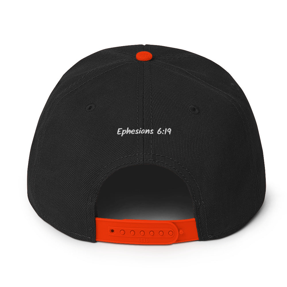 Back view of black Breath & Purpose snapback hat showing orange adjustable snap closure
