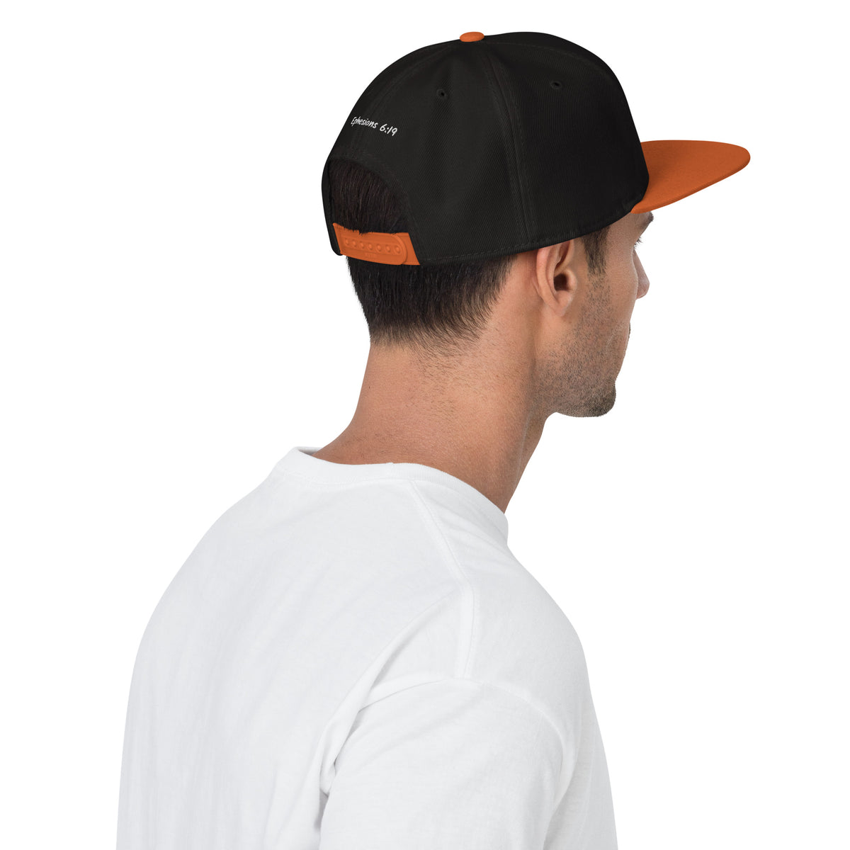 Rear view of black and orange Breath & Purpose snapback hat showing adjustable closure