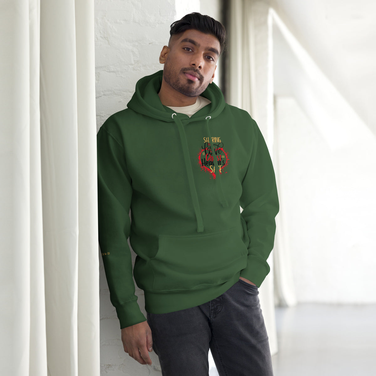 Front view of forest green For Heaven's Sake Christian hoodie with chest design