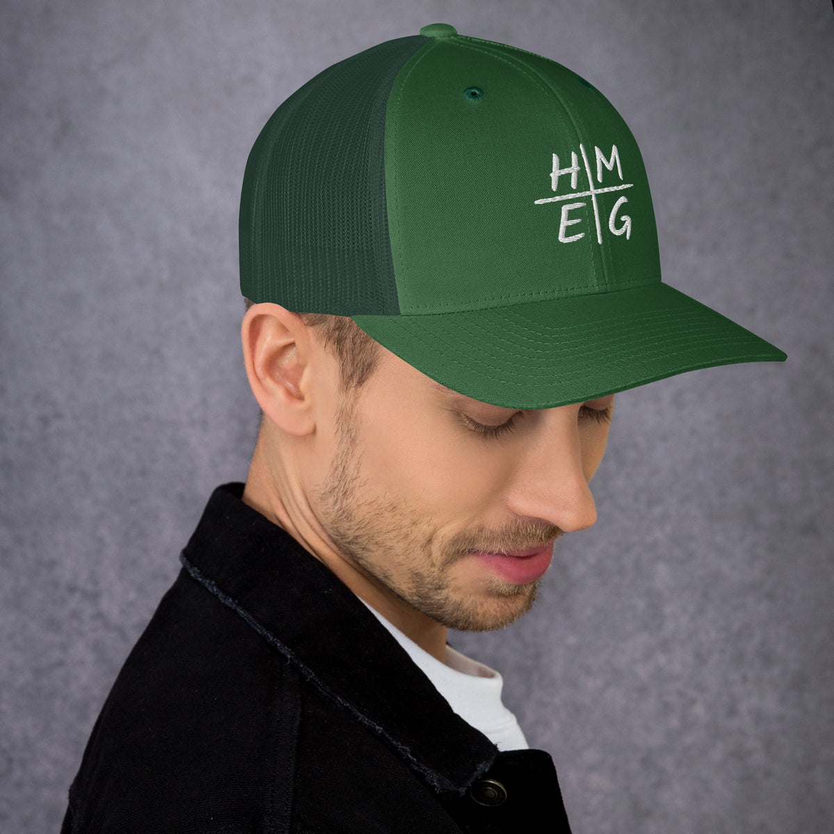 Evergreen green HMEG embroidered Christian trucker hat