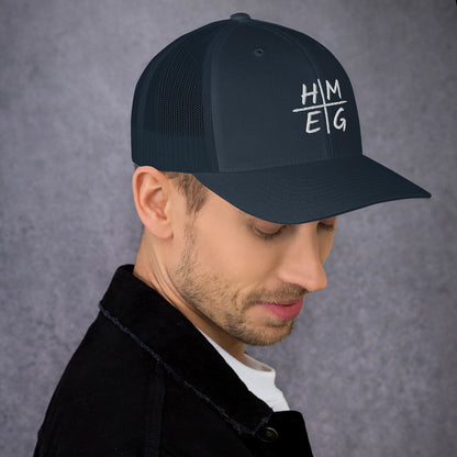 Navy blue HMEG Christian trucker hat with white embroidered lettering