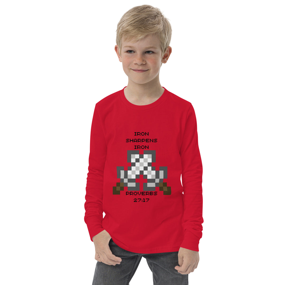 Boy wearing red Iron Sharpens Iron Christian youth long sleeve shirt with pixel-art swords inspired by Proverbs 27:17