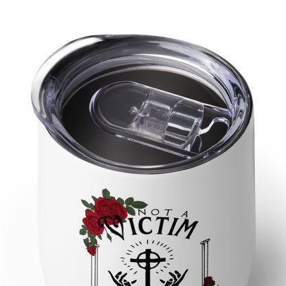Close-up of the clear sip lid on the Not a Victim stainless steel wine tumbler