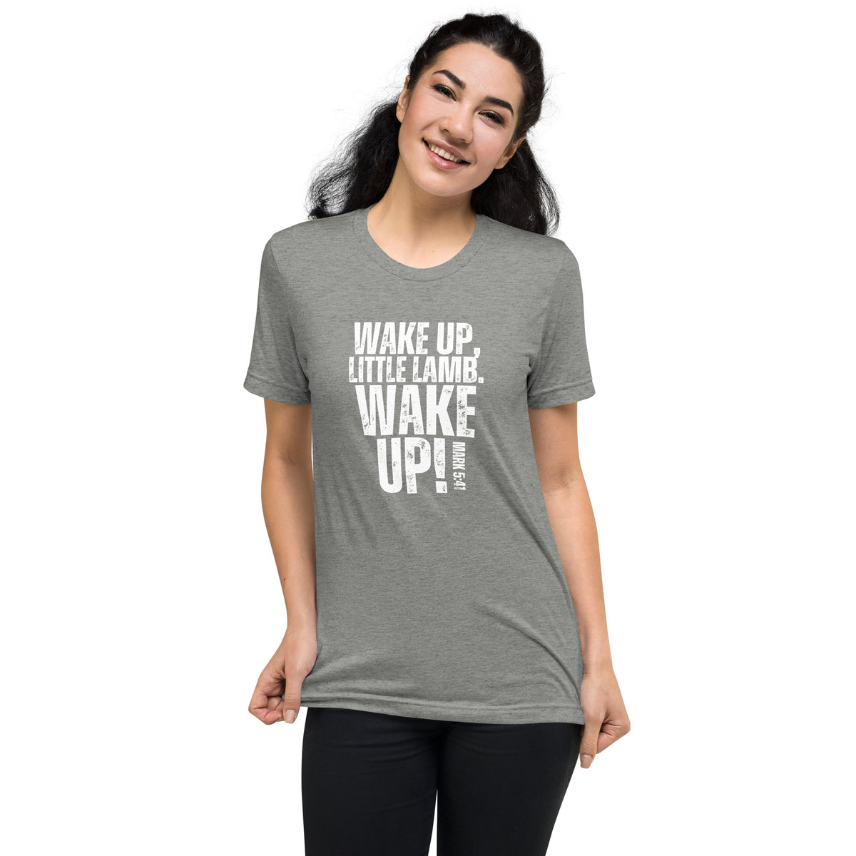 Woman wearing an athletic grey Wake Up Little Lamb Christian T-shirt with white design