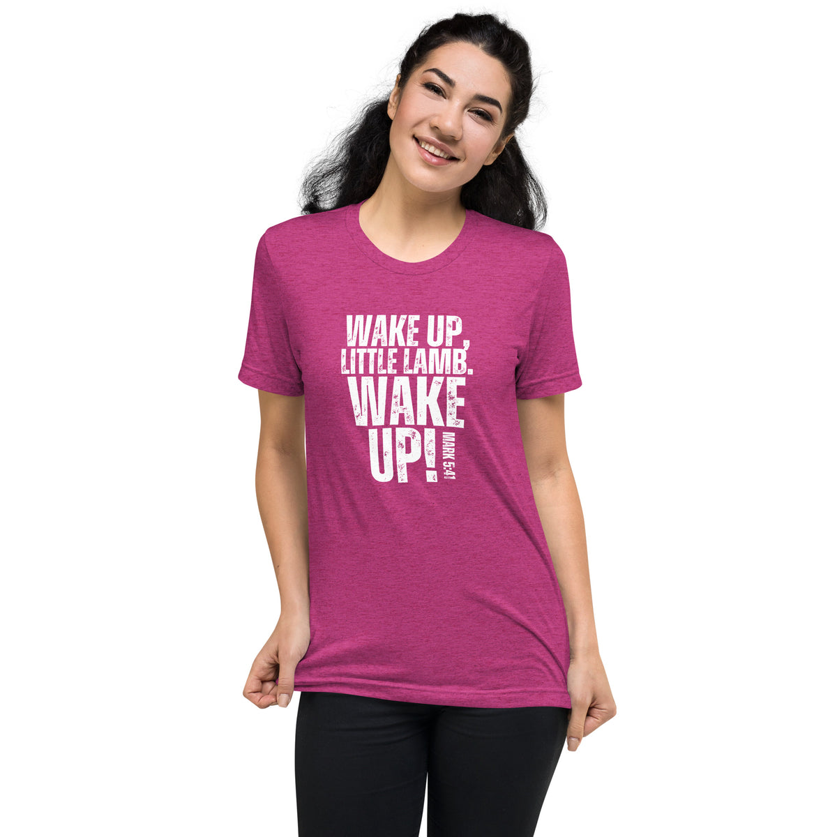 Woman wearing a berry pink Wake Up Little Lamb Christian T-shirt with white front design