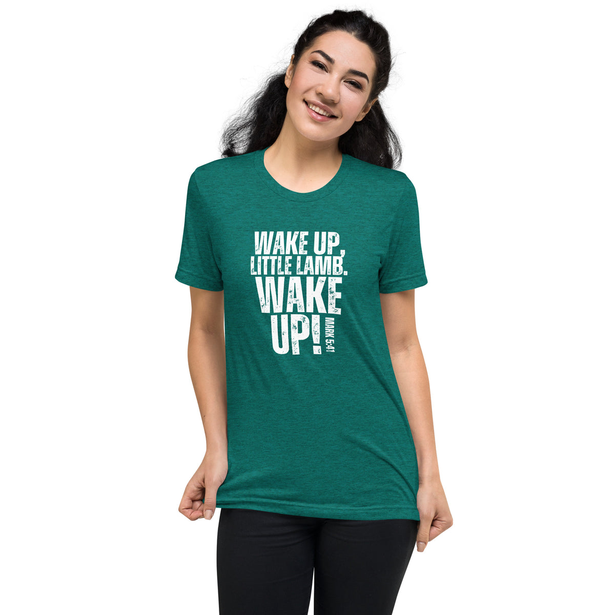 Model wearing an teal Wake Up Little Lamb Christian T-shirt with white Wake Up graphic